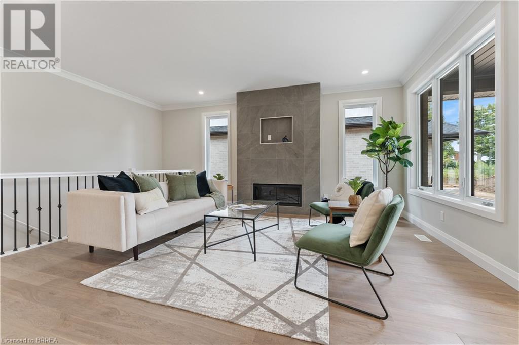 107 Judd Drive, Simcoe, ON - Indoor Photo Showing Living Room With Fireplace
