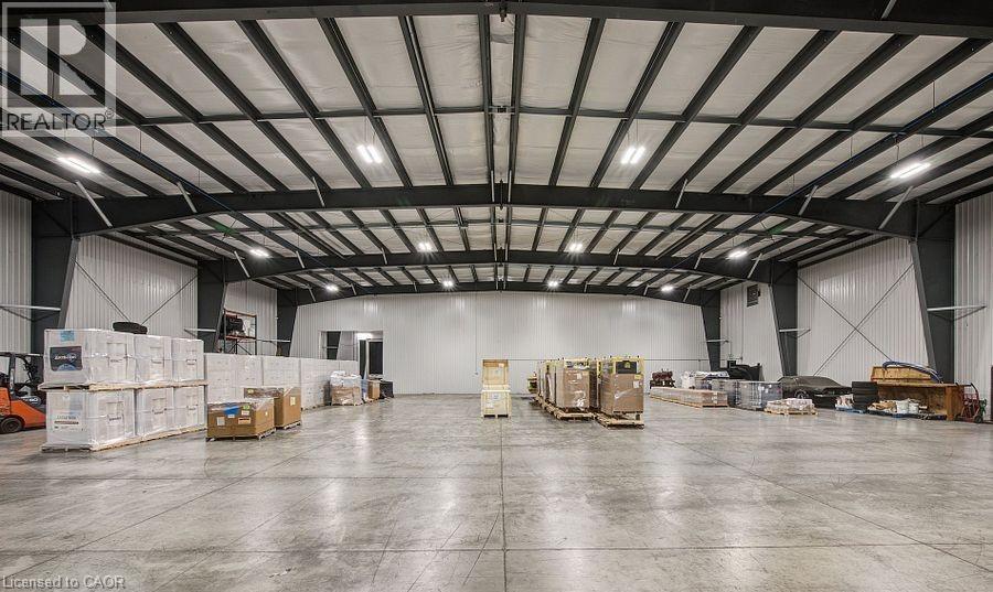 Garage featuring metal wall - 55 Progress Drive E, Aylmer, ON