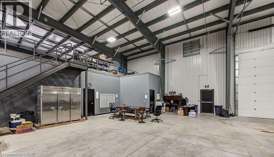 Garage featuring metal wall - 55 Progress Drive E, Aylmer, ON