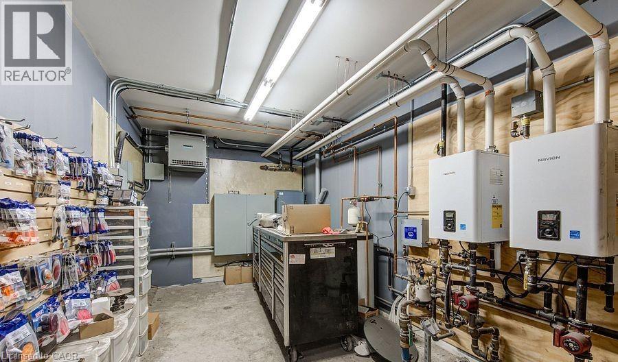 Utilities featuring water heater - 55 Progress Drive E, Aylmer, ON