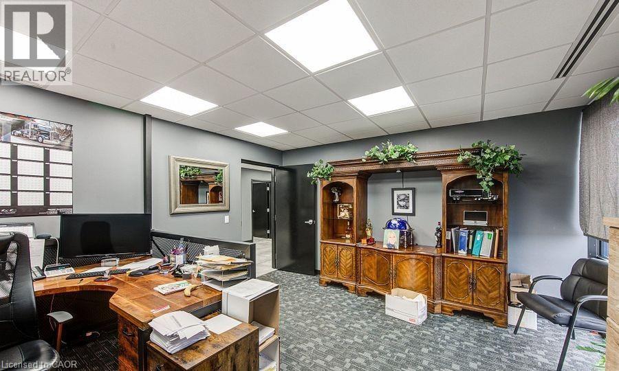 Office space featuring a drop ceiling - 55 Progress Drive E, Aylmer, ON