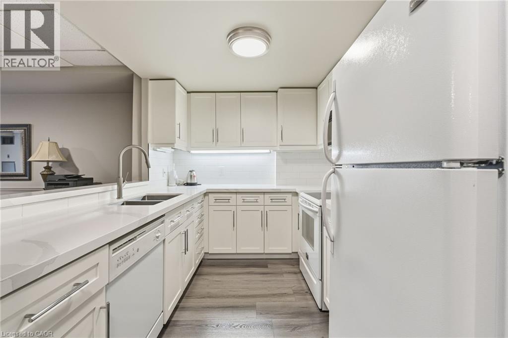 430 Pearl Street Unit# 403, Burlington, ON - Indoor Photo Showing Kitchen With Double Sink
