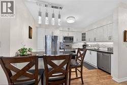 kitchen island with granite and bar stools -