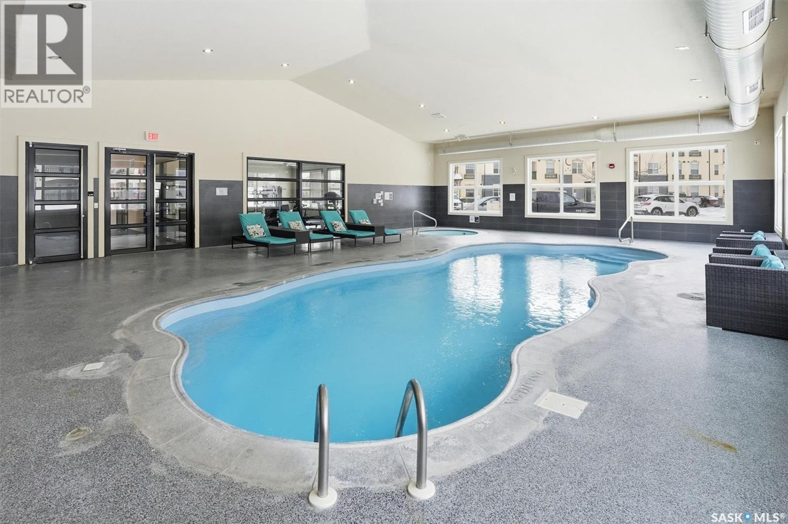 112 130 Phelps Way, Saskatoon, SK - Indoor Photo Showing Other Room With In Ground Pool