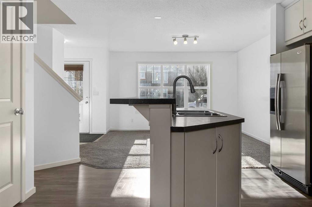 512 Evanston Drive Nw, Calgary, AB - Indoor Photo Showing Kitchen With Double Sink