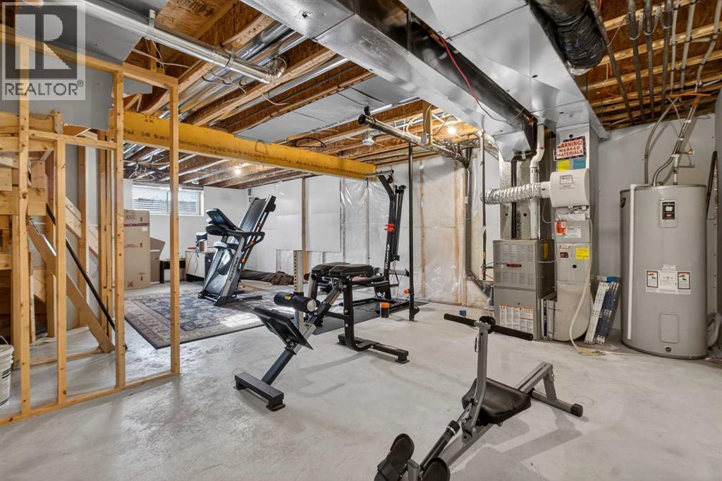 512 Evanston Drive Nw, Calgary, AB - Indoor Photo Showing Gym Room