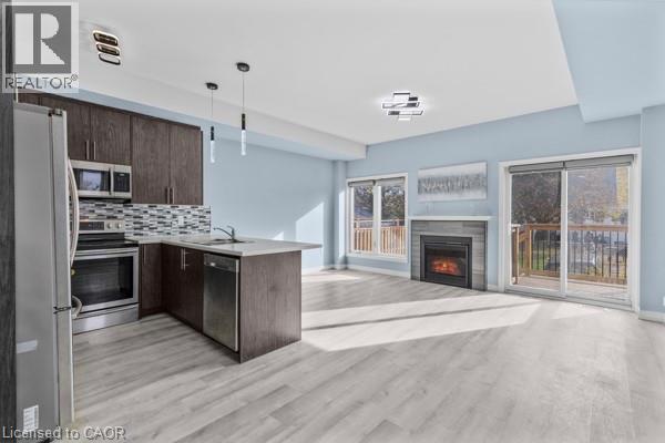 37 Delena Avenue S, Hamilton, ON - Indoor Photo Showing Kitchen With Fireplace