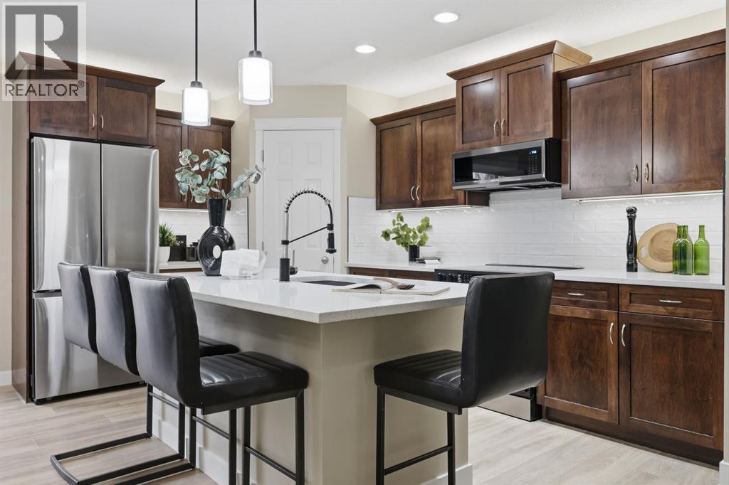 Completely renovated townhome - 117 Panatella Park Nw, Calgary, AB - Indoor Photo Showing Kitchen With Upgraded Kitchen