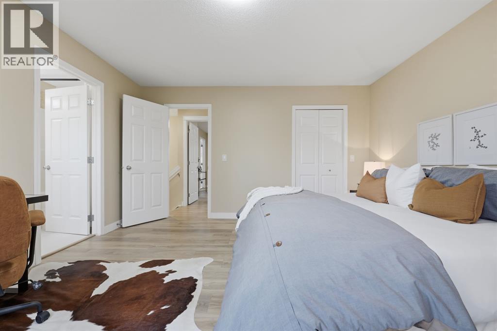 117 Panatella Park Nw, Calgary, AB - Indoor Photo Showing Bedroom