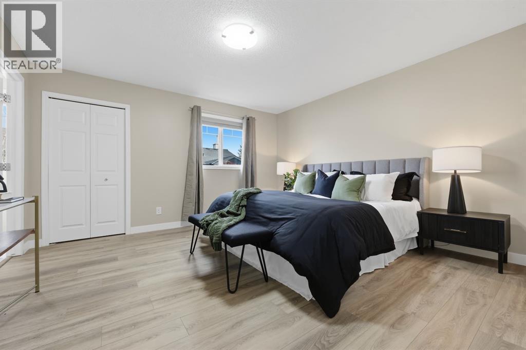 117 Panatella Park Nw, Calgary, AB - Indoor Photo Showing Bedroom