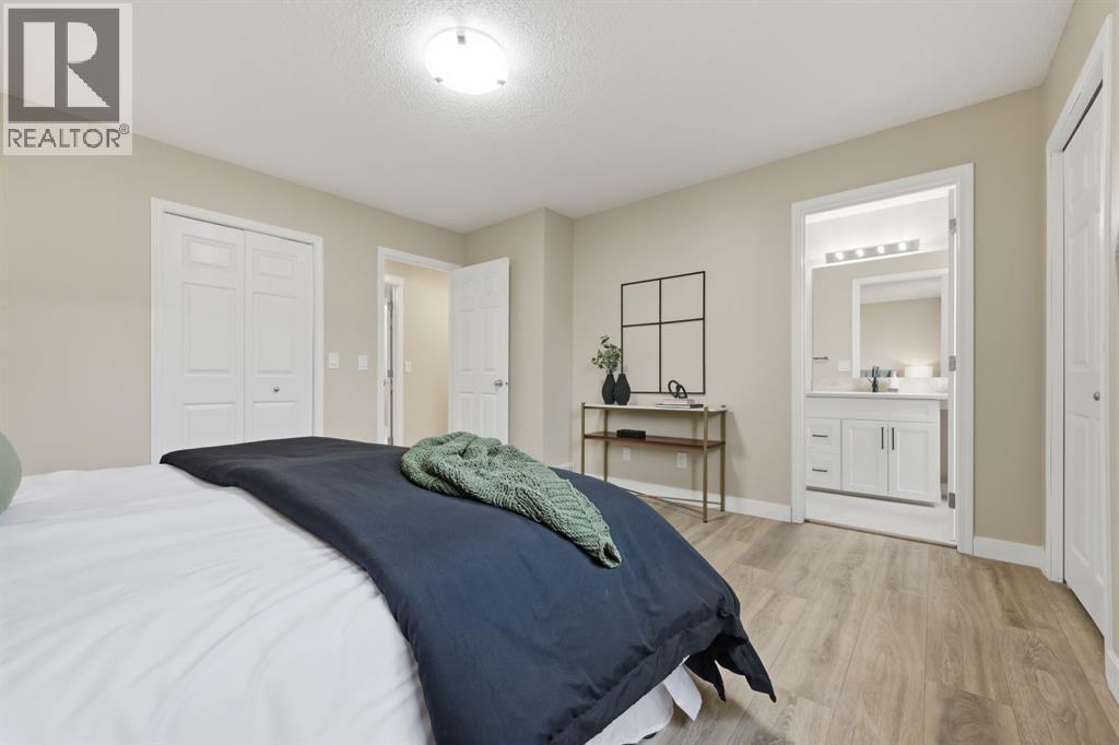 117 Panatella Park Nw, Calgary, AB - Indoor Photo Showing Bedroom