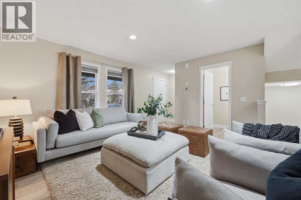 Great entertaining living space - 117 Panatella Park Nw, Calgary, AB - Indoor Photo Showing Living Room