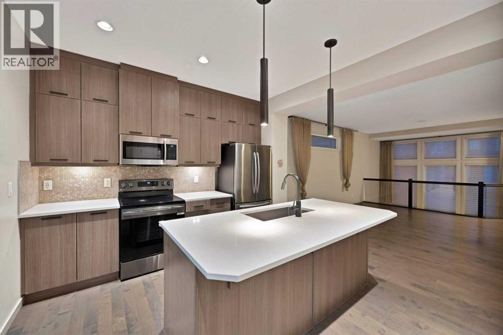 41 Red Embers Row Ne, Calgary, AB - Indoor Photo Showing Kitchen With Stainless Steel Kitchen With Double Sink