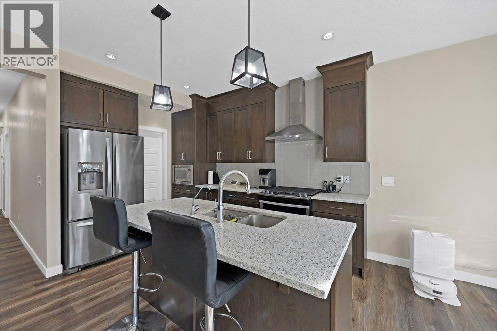93 Saddlestone Place Ne, Calgary, AB - Indoor Photo Showing Kitchen With Double Sink With Upgraded Kitchen