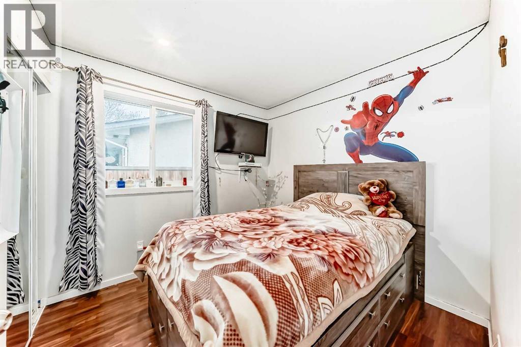 Bedroom 2 - 707 Malvern Drive Ne, Calgary, AB - Indoor Photo Showing Bedroom