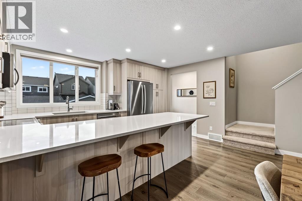 295 Masters Row Se, Calgary, AB - Indoor Photo Showing Kitchen With Upgraded Kitchen
