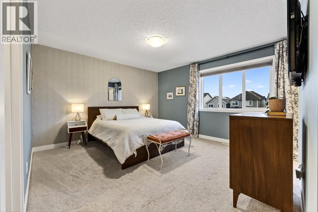 295 Masters Row Se, Calgary, AB - Indoor Photo Showing Bedroom