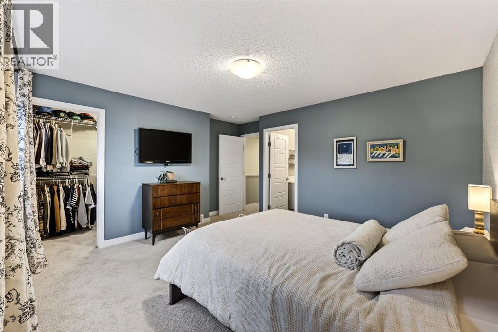 295 Masters Row Se, Calgary, AB - Indoor Photo Showing Bedroom