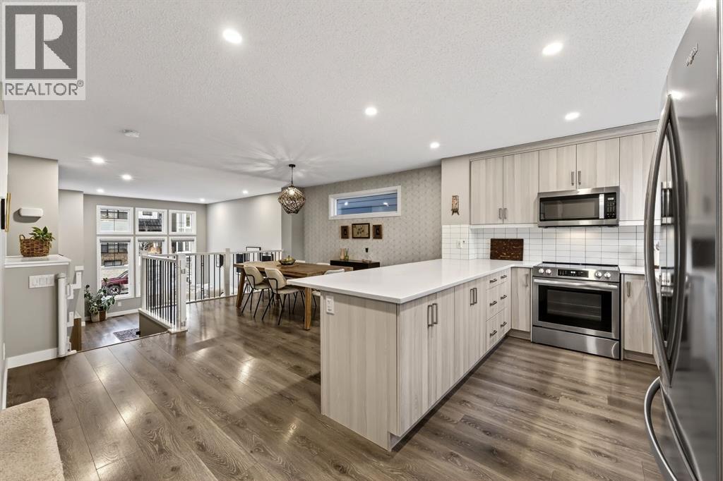 295 Masters Row Se, Calgary, AB - Indoor Photo Showing Kitchen With Upgraded Kitchen