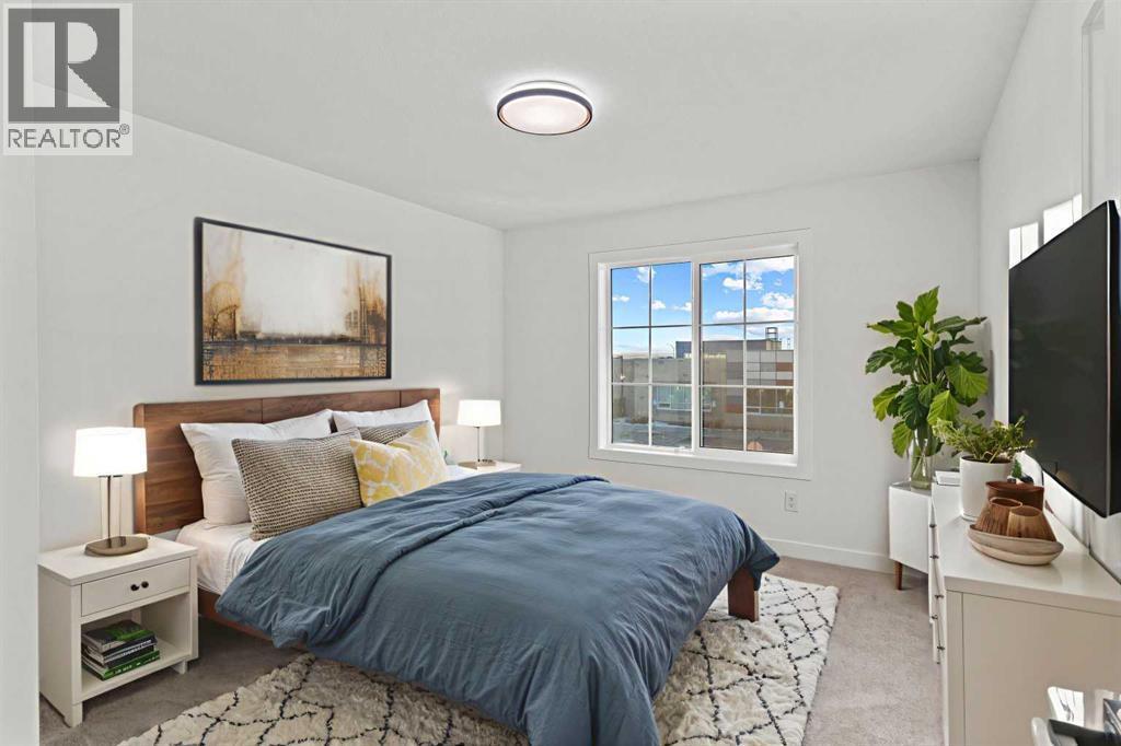 8 Ranchers Meadows, Okotoks, AB - Indoor Photo Showing Bedroom
