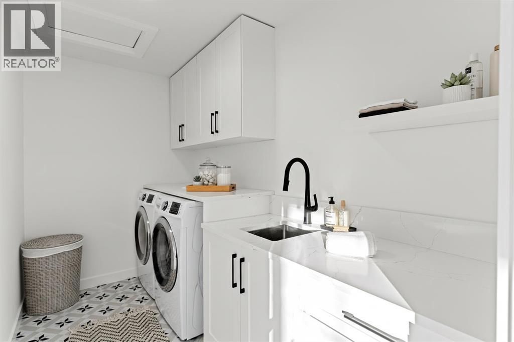 8 Ranchers Meadows, Okotoks, AB - Indoor Photo Showing Laundry Room