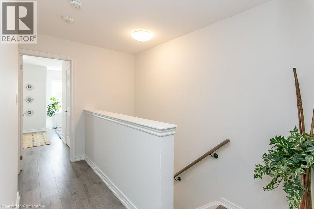 Hall featuring an upstairs landing and light wood-style floors - 386 Linden Drive, Cambridge, ON - Indoor Photo Showing Other Room