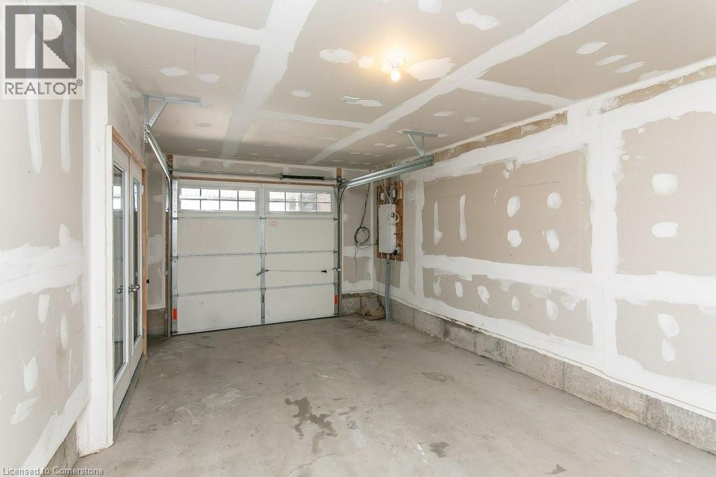 View of garage - 386 Linden Drive, Cambridge, ON - Indoor Photo Showing Garage