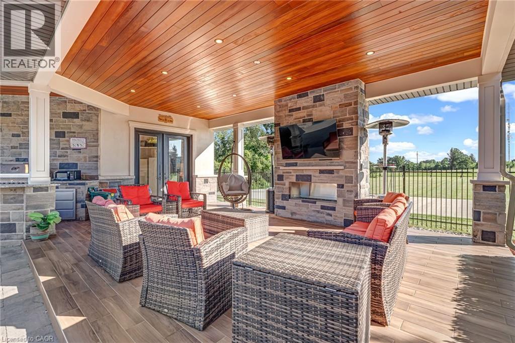 3122 Cedar Springs Road, Burlington, ON - Outdoor With Fireplace With Deck Patio Veranda