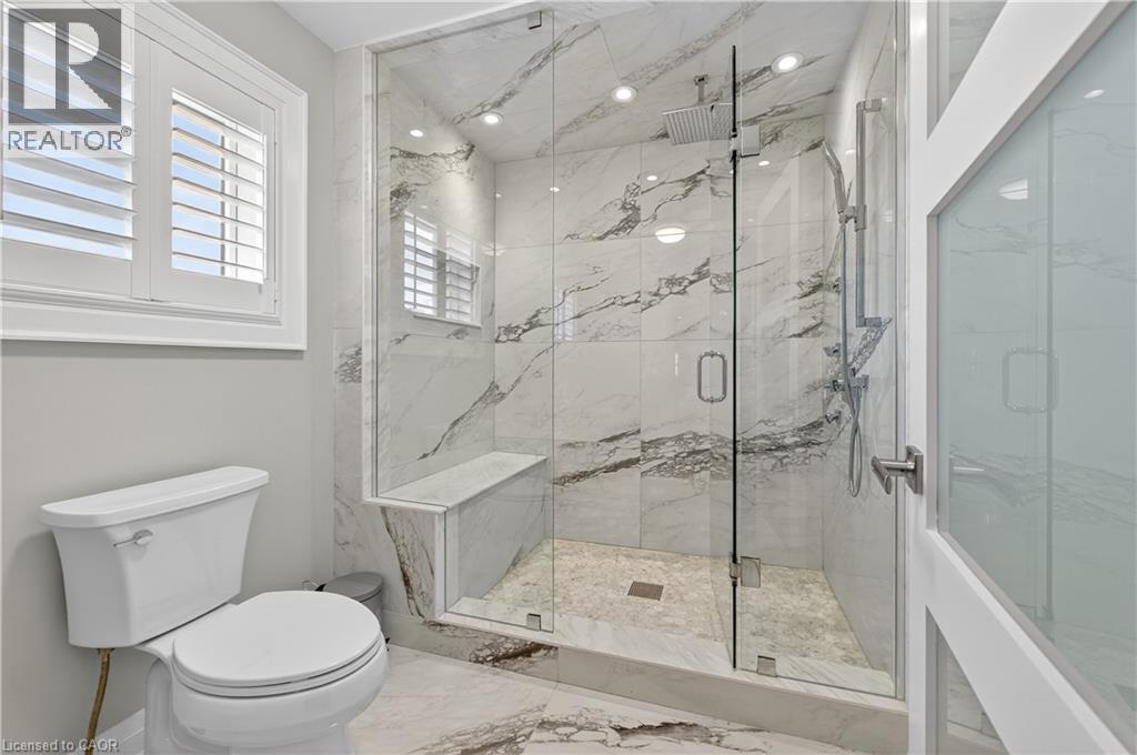 Bathroom with a marble finish shower and marble finish floors - 18 David Avenue, Hamilton, ON - Indoor Photo Showing Bathroom