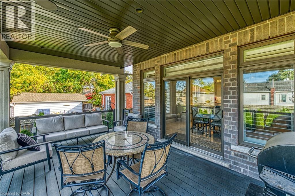 Deck featuring grilling area, outdoor dining area, an outdoor hangout area, and ceiling fan - 18 David Avenue, Hamilton, ON - Outdoor With Deck Patio Veranda With Exterior