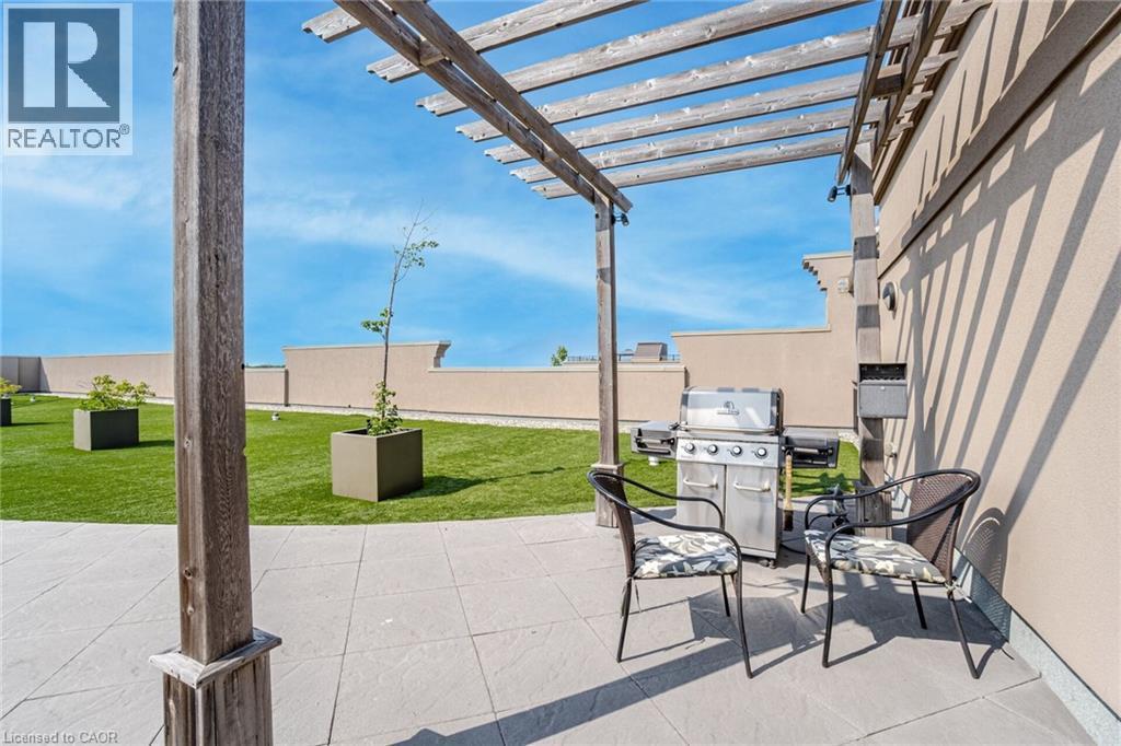View of patio / terrace featuring grilling area and a pergola - 5317 Upper Middle Road Unit# 112, Burlington, ON - Outdoor