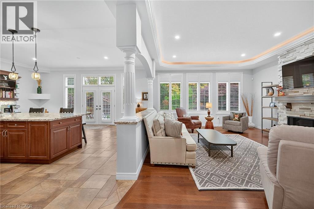 248 Cloverleaf Drive, Ancaster, ON - Indoor Photo Showing Living Room With Fireplace