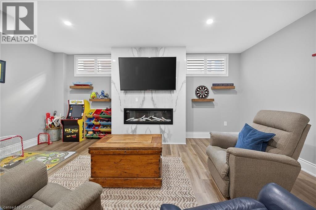 248 Cloverleaf Drive, Ancaster, ON - Indoor Photo Showing Basement With Fireplace
