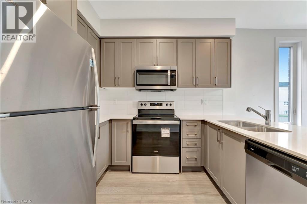 99 Roger Street Unit# 45, Waterloo, ON - Indoor Photo Showing Kitchen With Double Sink