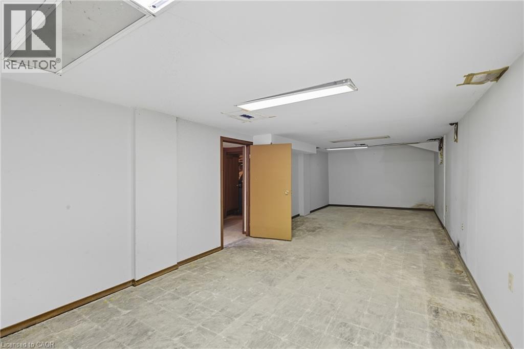 Finished basement with light flooring - 1036 Upper Wentworth Street, Hamilton, ON