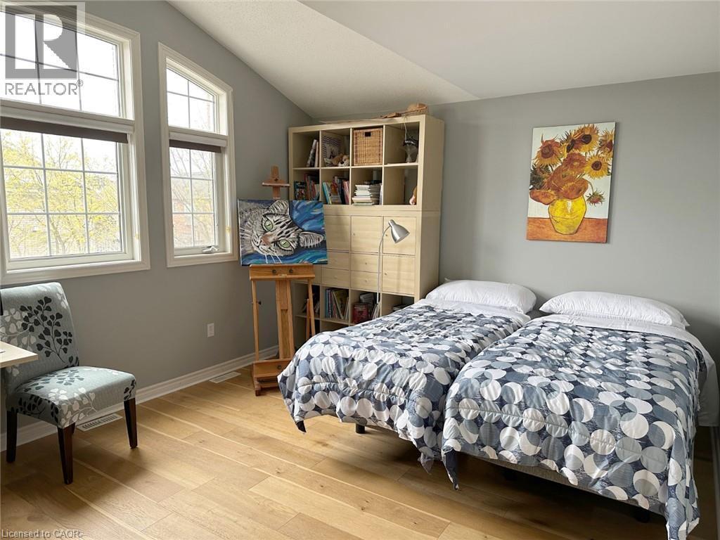 Bedroom featuring wood finished floors and vaulted ceiling - 2429 Whitehorn Drive, Burlington, ON - Indoor Photo Showing Bedroom