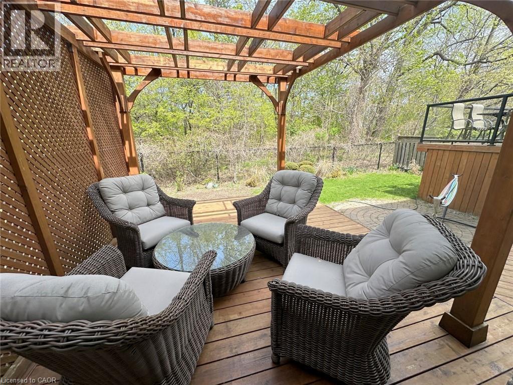 Wooden deck featuring a fenced backyard and a pergola - 2429 Whitehorn Drive, Burlington, ON - Outdoor With Deck Patio Veranda With Exterior