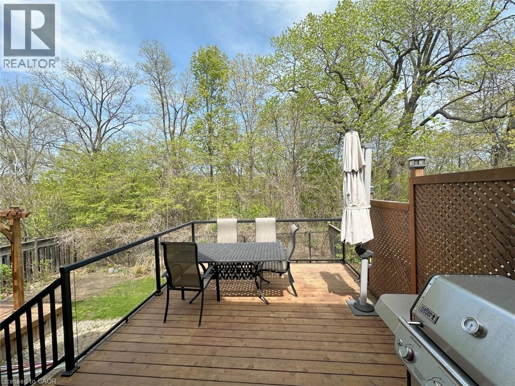 Wooden terrace featuring grilling area and outdoor dining space - 2429 Whitehorn Drive, Burlington, ON - Outdoor With Deck Patio Veranda