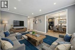 Virtually staged living room. -