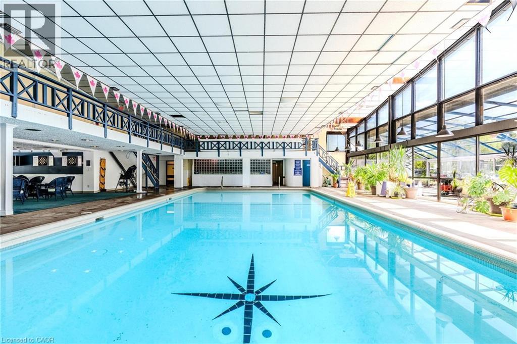 Indoor pool with a patio and a pergola - 57 12Th Conc Road E Unit# 430, Flamborough, ON - Indoor Photo Showing Other Room With In Ground Pool