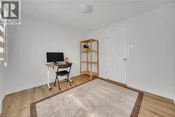 Office space featuring light wood-style flooring -