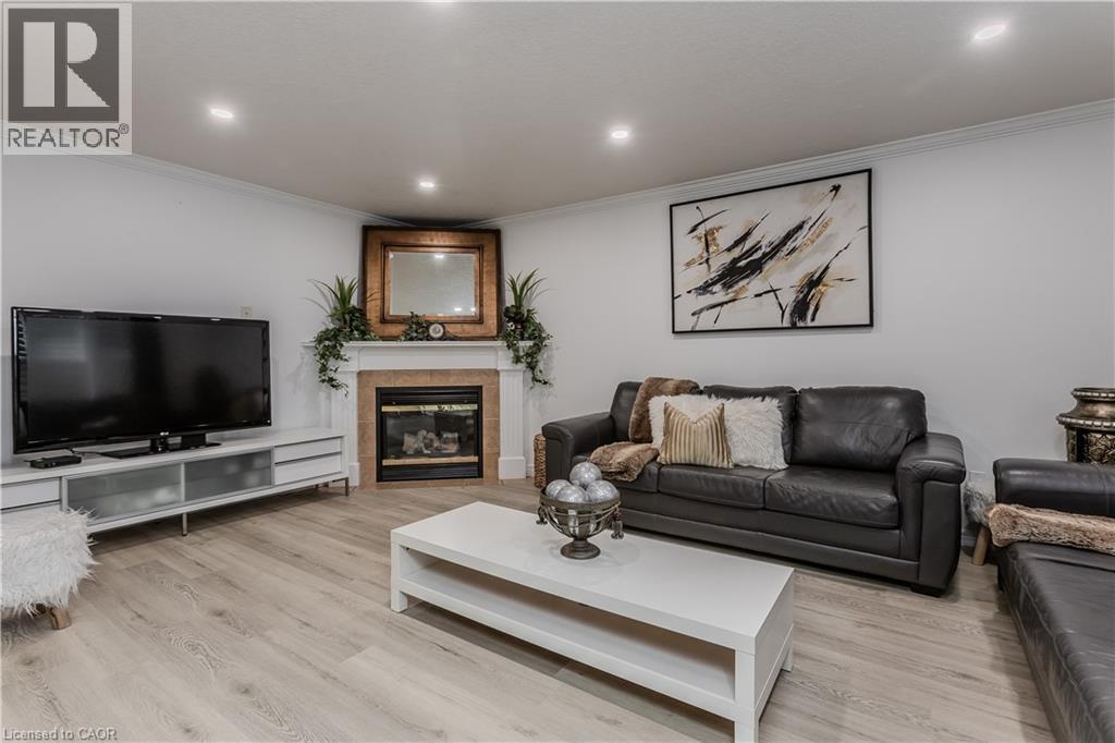 26 Grassyplain Drive, Mount Hope, ON - Indoor Photo Showing Living Room With Fireplace