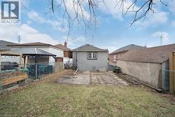Back of property with a patio and a gazebo -