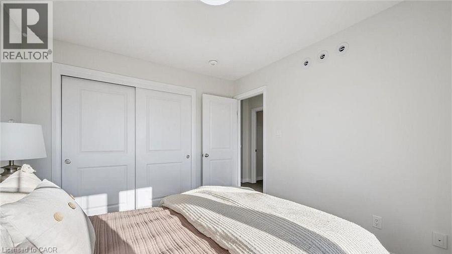 Bedroom with a closet - 24 Morrison Road Unit# D9, Kitchener, ON - Indoor Photo Showing Bedroom