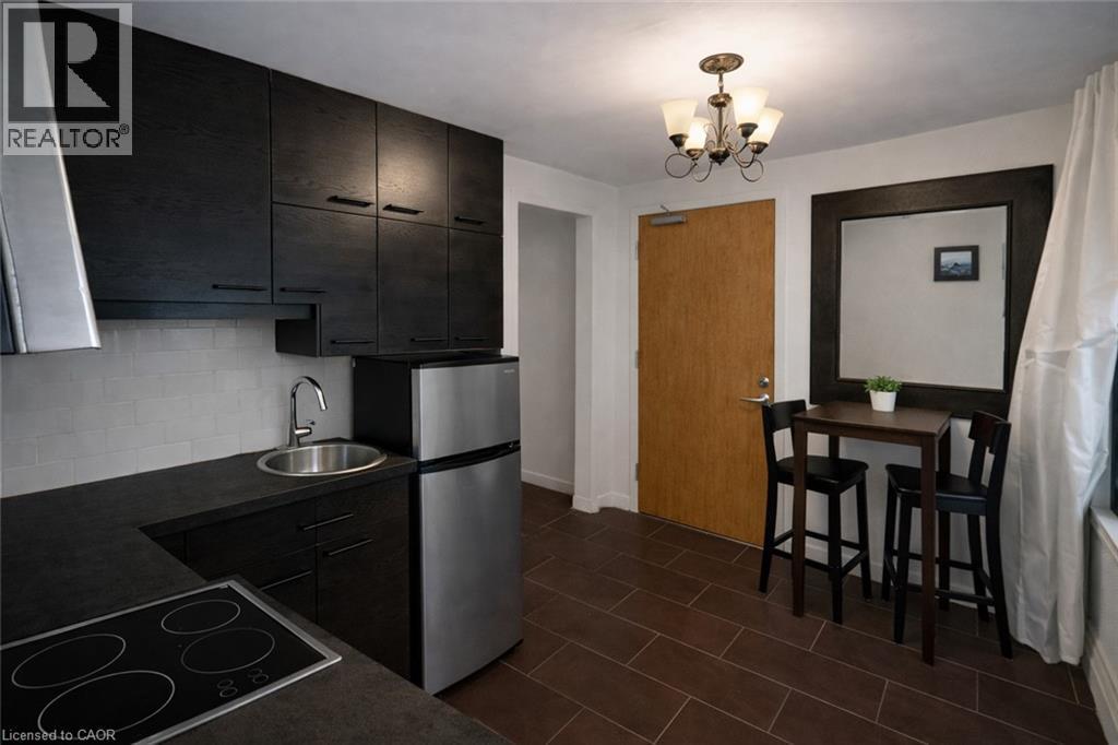 Unit 4 Kitchen/ Dinning - Image AI generated to remove Tenants belongings, Unit is similar to picture but may not be identical - Photo is for information purposes only. - 237 James Street N, Hamilton, ON