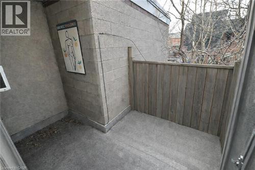 Unit 4 Patio - Image AI generated to remove Tenants belongings, Unit is similar to picture but may not be identical - Photo is for information purposes only. - 237 James Street N, Hamilton, ON 