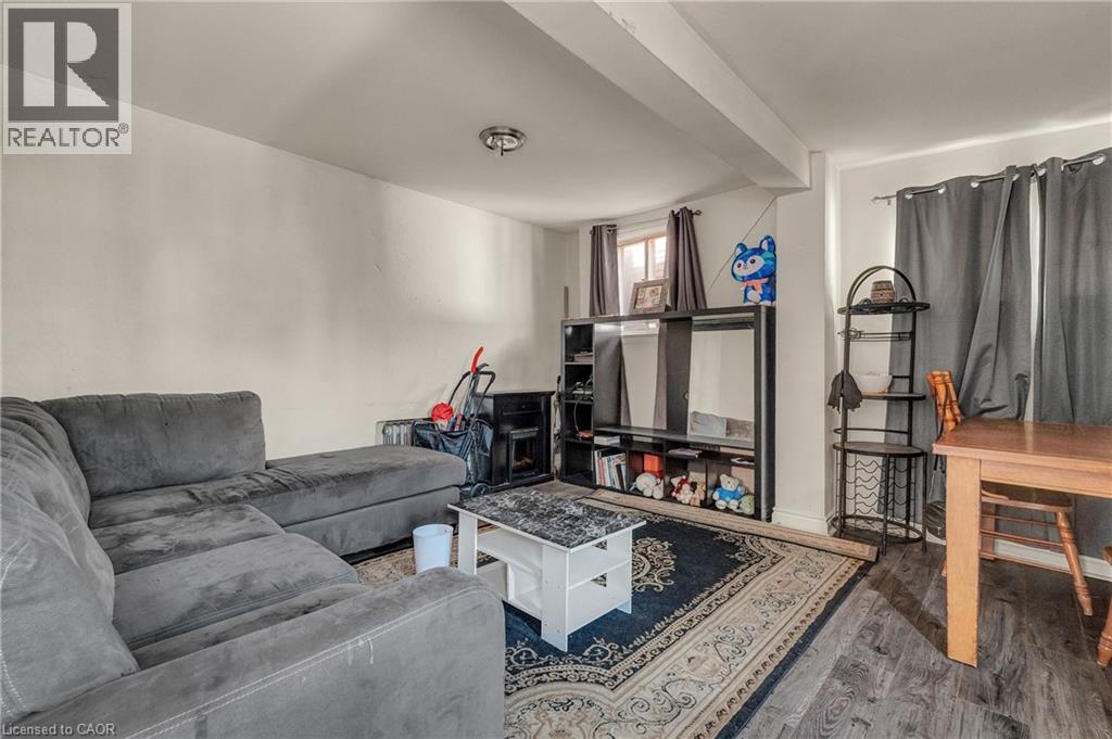 Living room with wood finished floors - 70 Ottawa Street N, Hamilton, ON - Indoor