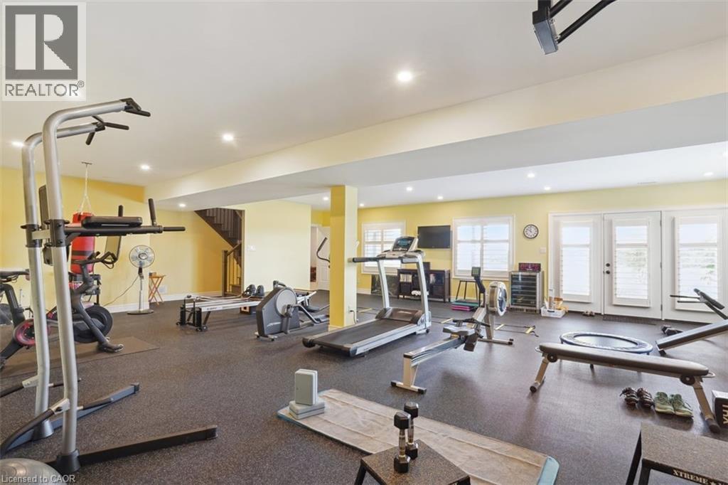 Walk-Out to Back Yard Garden - 434555 4Th Line, Amaranth, ON - Indoor Photo Showing Gym Room