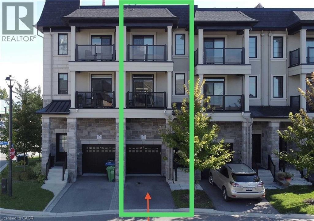 View of property with driveway and an attached garage - 588 Rapids Lane, Mississauga, ON - Outdoor With Balcony With Facade