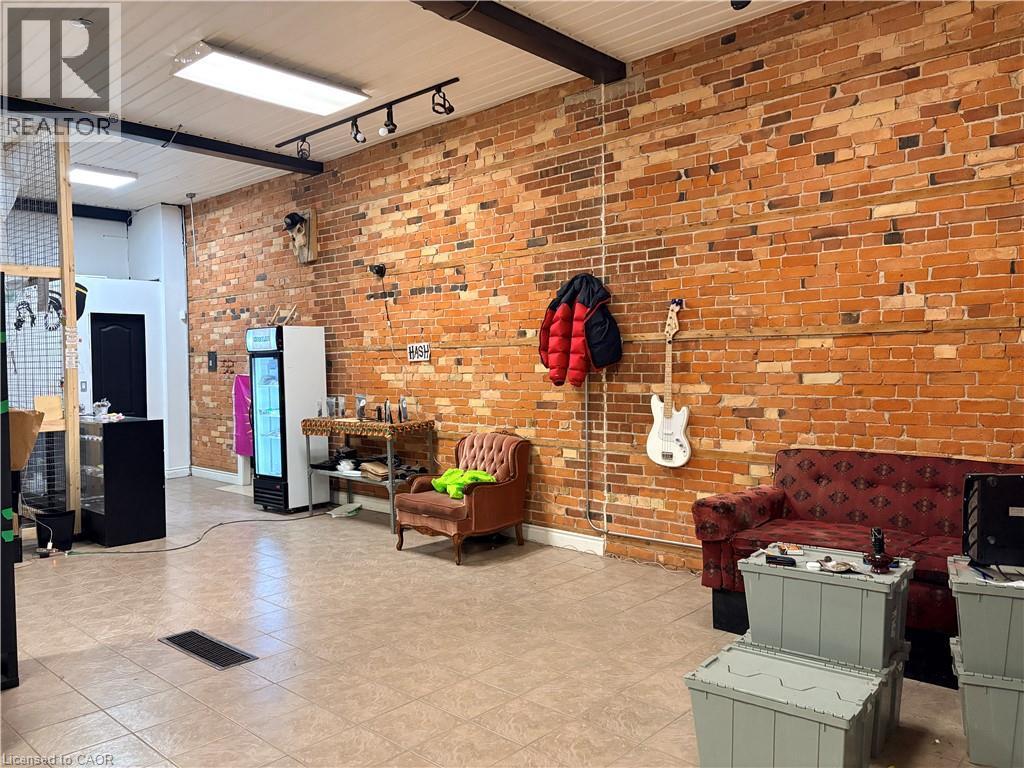 Community lobby with brick wall and wooden ceiling - 774 Barton Street E, Hamilton, ON